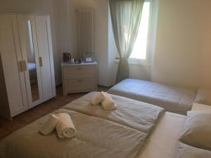 Voodi või voodid majutusasutuse Albergo Ristorante Belcantone toas