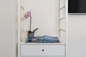 TV a/nebo společenská místnost v ubytování D-Home Ortigia