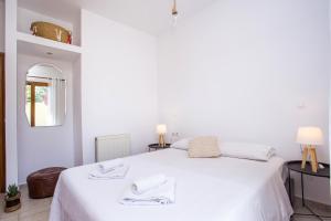 Katil atau katil-katil dalam bilik di Apartment Ivy Kallithea