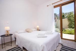 Katil atau katil-katil dalam bilik di Apartment Ivy Kallithea