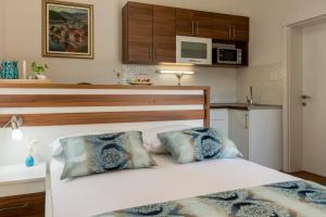 Kuchyň nebo kuchyňský kout v ubytování Apartments Stella del Mare