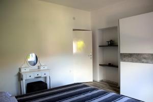 Postel nebo postele na pokoji v ubytování Apartman Ana