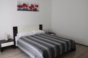 Postel nebo postele na pokoji v ubytování Apartman Ana
