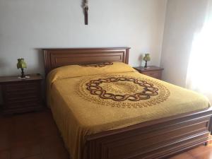 A bed or beds in a room at Villa Romolina