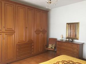 A bed or beds in a room at Villa Romolina