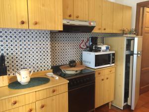 A kitchen or kitchenette at Villa Romolina