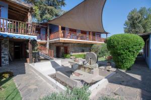 Un jardín fuera de La Casa Azul Huasca & Restaurante La Terraza