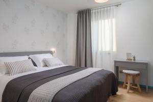 Posteľ alebo postele v izbe v ubytovaní Villa Marulovo Hills