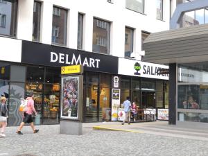 Supermarket nebo jiné obchody v  apartmánu nebo okolí