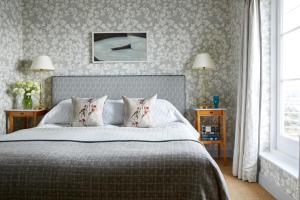 Ein Bett oder Betten in einem Zimmer der Unterkunft Hotel Tresanton