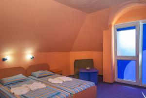 Postel nebo postele na pokoji v ubytování Dara Hotel + 37 fotografií