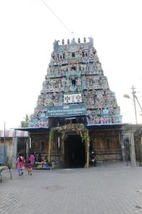 a large building with people standing in front of it at Ranga Residency in Mayiladuthurai