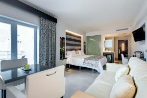 Voodi või voodid majutusasutuse Barceló Hamilton Menorca - Adults Only toas