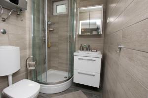 Koupelna v ubytování Apartment Roje + 20 fotografií