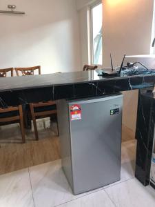 Kuchyň nebo kuchyňský kout v ubytování Home Suhaila