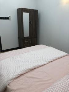 Postel nebo postele na pokoji v ubytování Home Suhaila
