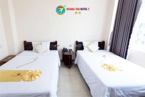 Una cama o camas en una habitación de Hong phuc Hotel