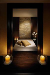 Uma cama ou camas num quarto em Asiana Hotel Dubai