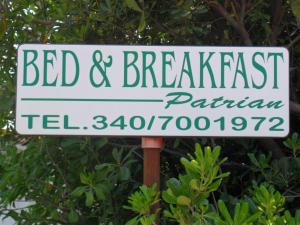 a sign that reads bed and breakfast patreon at Patrian in Grottaferrata