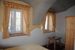 Postel nebo postele na pokoji v ubytování Gartler's Appartements