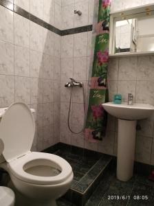 Kúpeľňa v ubytovaní LAZAROS APARTMENTS