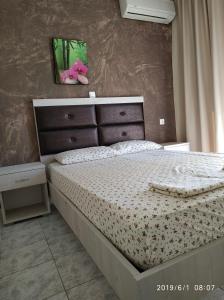 Posteľ alebo postele v izbe v ubytovaní LAZAROS APARTMENTS