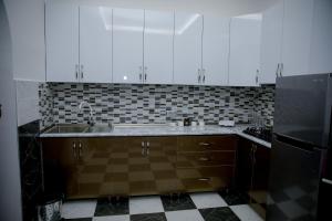 A kitchen or kitchenette at EUPHORIA Mariam