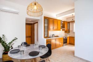 Eldhús eða eldhúskrókur á Apartment Ivy Kallithea +21 mynd