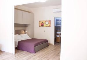 Posteľ alebo postele v izbe v ubytovaní Casa Lorenzo