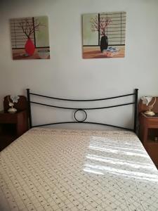 En eller flere senge i et værelse på Casa vacanze 1 80m dal mare