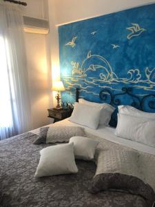 Voodi või voodid majutusasutuse Thalassa Hotel toas