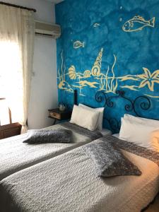 Voodi või voodid majutusasutuse Thalassa Hotel toas