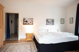 Postel nebo postele na pokoji v ubytování Living Eden by we rent, SUMMERCARD INCLUDED