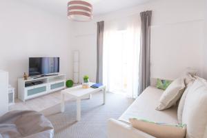 Μια τηλεόραση ή/και κέντρο ψυχαγωγίας στο The Yellow House Cascais