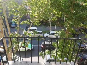 an aerial view of a parking lot with cars parked at Cascade White Luxury Apartment in Yerevan