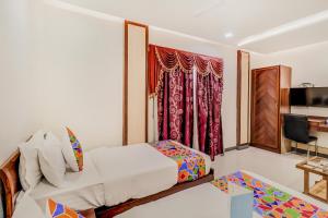 Postel nebo postele na pokoji v ubytování Hotel Summit