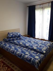 Postelja oz. postelje v sobi nastanitve Casa Maria