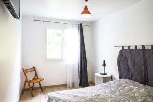 Postel nebo postele na pokoji v ubytování La Provence