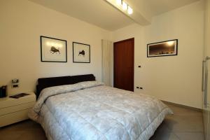 Ένα ή περισσότερα κρεβάτια σε δωμάτιο στο Mango Pineto Vacanza