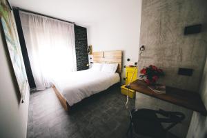 Postel nebo postele na pokoji v ubytování Fuoricittà