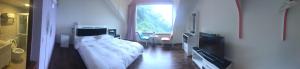 TV a/nebo společenská místnost v ubytování Yun Waterfall Valley Homestay