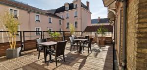 Balkón nebo terasa v ubytování HOTEL & SPA Le Renard Centre