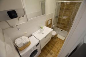 Kúpeľňa v ubytovaní Bruno Apartment + 11 fotografií