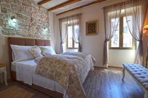 Posteľ alebo postele v izbe v ubytovaní Bruno Apartment