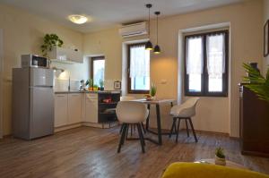 Kuchyňa alebo kuchynka v ubytovaní Bruno Apartment