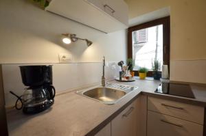 Kuchyňa alebo kuchynka v ubytovaní Bruno Apartment