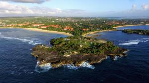 an island in the middle of the ocean at Timbis Homestay Bali in Nusa Dua