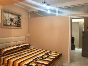 Postel nebo postele na pokoji v ubytování Friendly Apartment