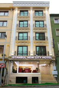 a tall building with a new city hotel at Istanbul Newcity Hotel in Istanbul