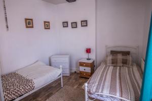 Letto o letti in una camera di Saracens Head Old Function Room